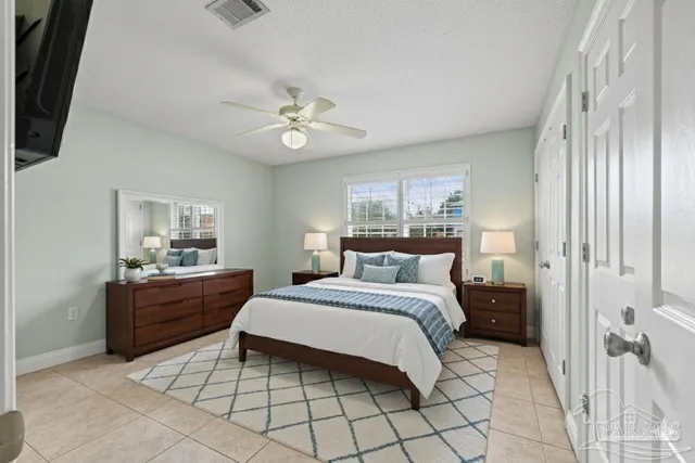 a spacious bathroom with a granite countertop sink mirror and a