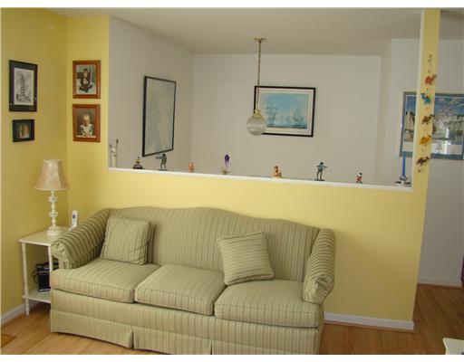 37 West View Road Middletown, RI 02842 - Photo 2 of 12 Living Room. Front entry staircase beyond half wall.