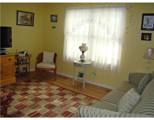 37 West View Road Middletown, RI 02842 - Photo 3 of 12 Living Room. Double windows brings in nice light.