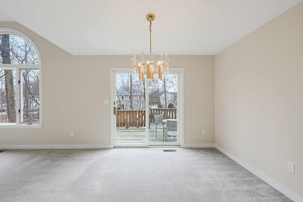 38 Poppasquash Road, Unit 38 North Attleboro, MA 02760 - Photo 11 of 36 a view of an empty room with a window
