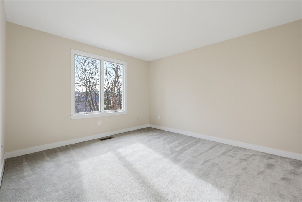 38 Poppasquash Road, Unit 38 North Attleboro, MA 02760 - Photo 20 of 36 an empty room with windows