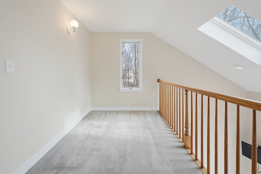 38 Poppasquash Road, Unit 38 North Attleboro, MA 02760 - Photo 23 of 36 a view of a hallway with windows