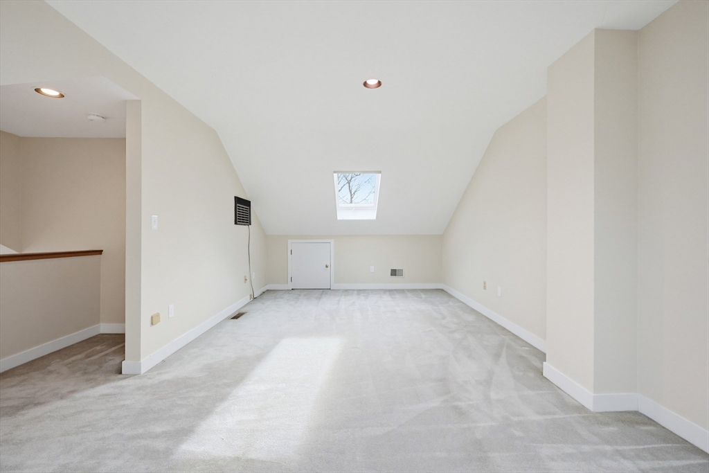 38 Poppasquash Road, Unit 38 North Attleboro, MA 02760 - Photo 26 of 36 wooden floor in an empty room