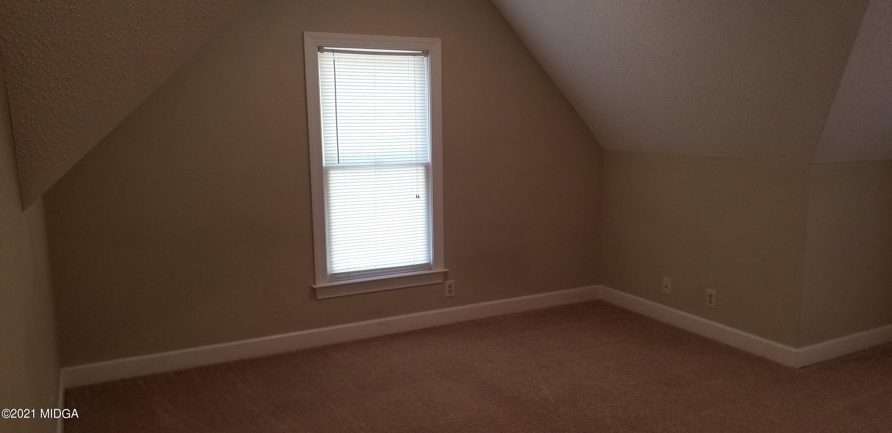 208 Gates Road Lizella, GA 31052 - Photo 39 of 55 an empty room with a window