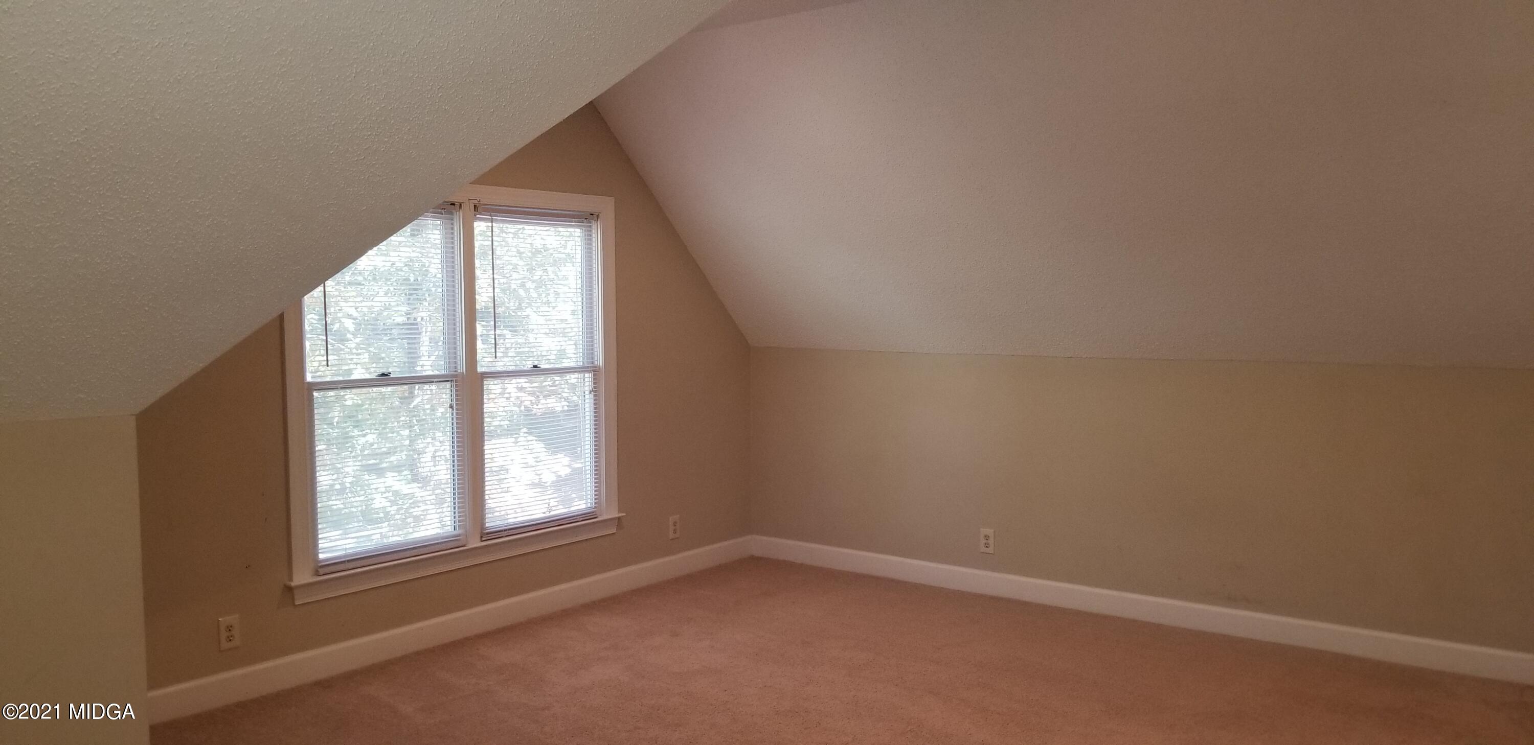 208 Gates Road Lizella, GA 31052 - Photo 44 of 55 an empty room with a window