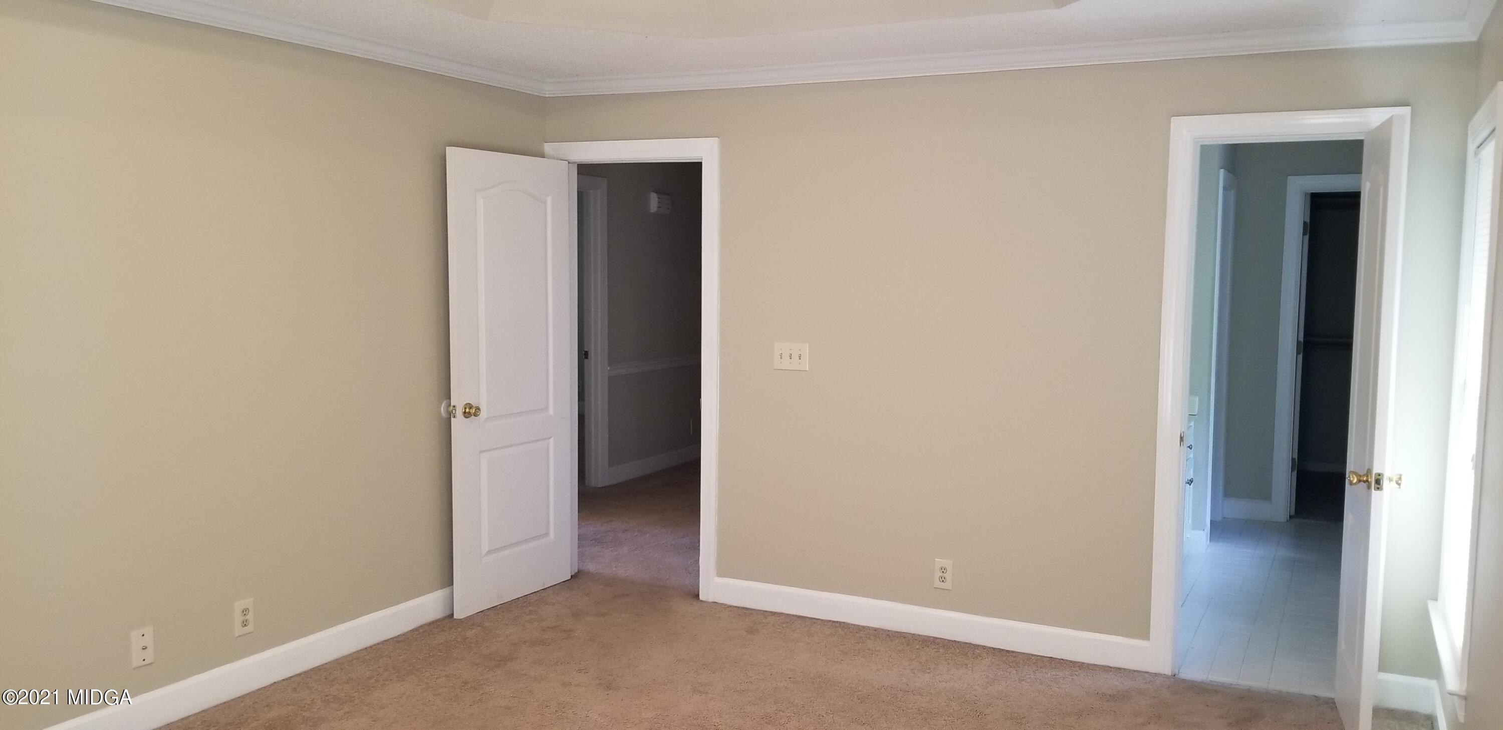208 Gates Road Lizella, GA 31052 - Photo 45 of 55 a view of an empty room with closet and a window