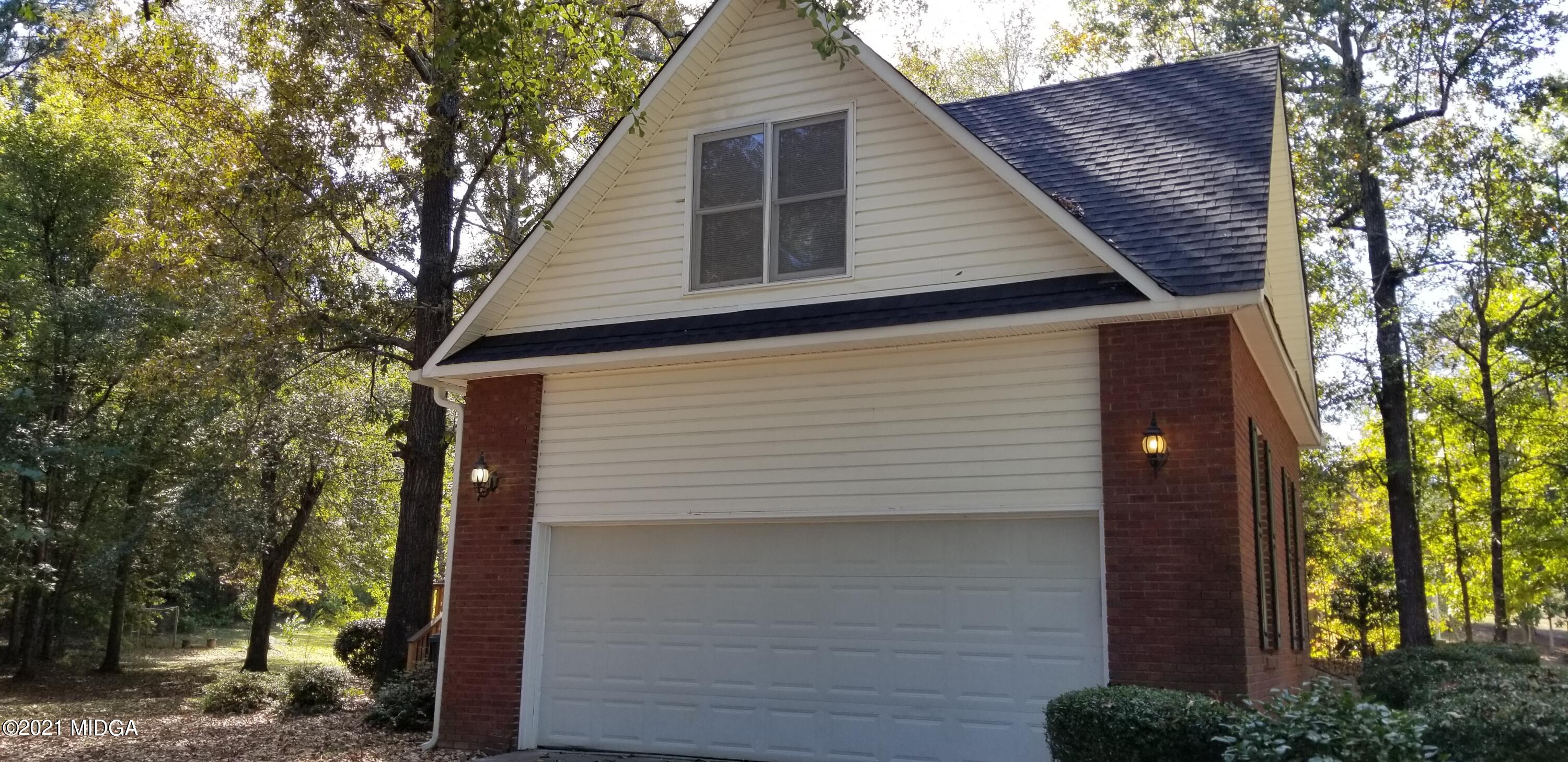 208 Gates Road Lizella, GA 31052 - Photo 48 of 55 a side view of a house