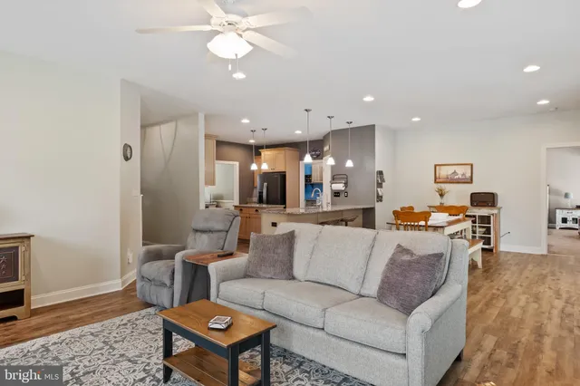a view of swimming pool with seating area