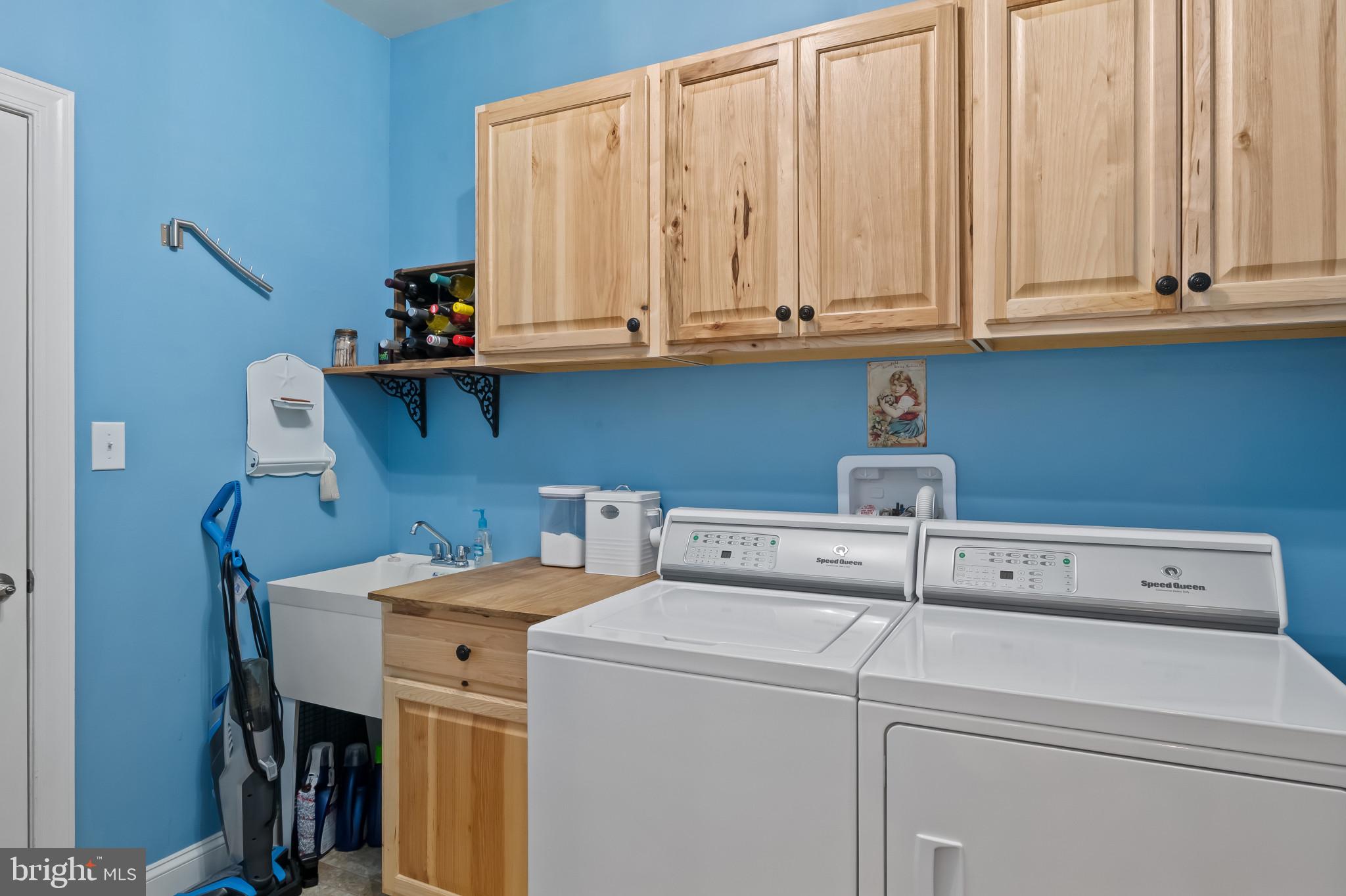 18067 Emerson Way Georgetown, DE 19947 - Photo 25 of 37 a utility room with dryer and washer