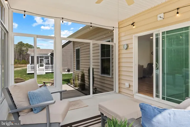 a front view of house with yard patio and green space