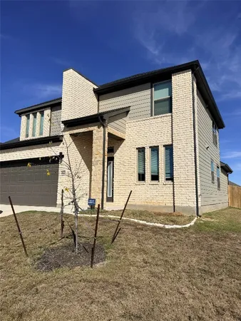 a house view with a outdoor space
