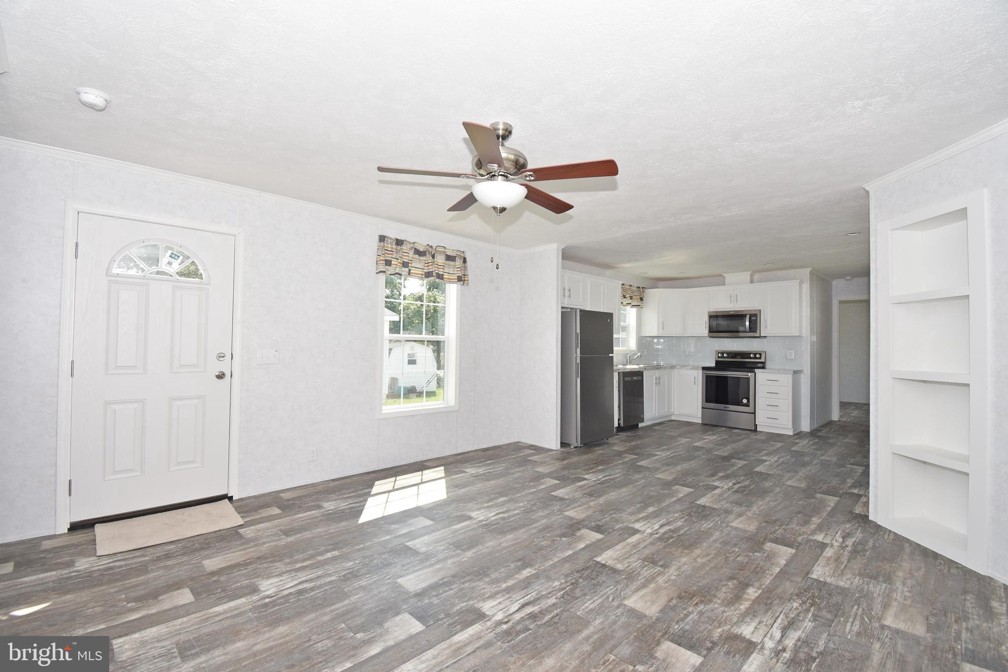 5814 Homestead Street Salisbury, MD 21801 - Photo 3 of 12 a view of a kitchen with a sink and a window