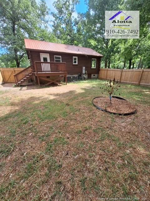 268 West Manchester Road Spring Lake, NC 28390 - Photo 10 of 10 a view of a house with a yard