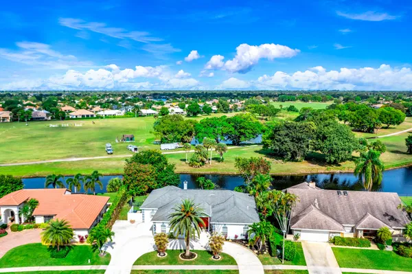 a view of a city with lawn chairs