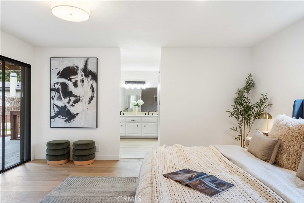 931 Camino Ramon Danville, CA 94526 - Photo 15 of 67 a bedroom with a bed and a couch