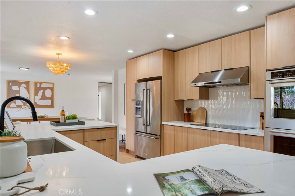 931 Camino Ramon Danville, CA 94526 - Photo 29 of 67 a kitchen with stainless steel appliances granite countertop a sink and a refrigerator