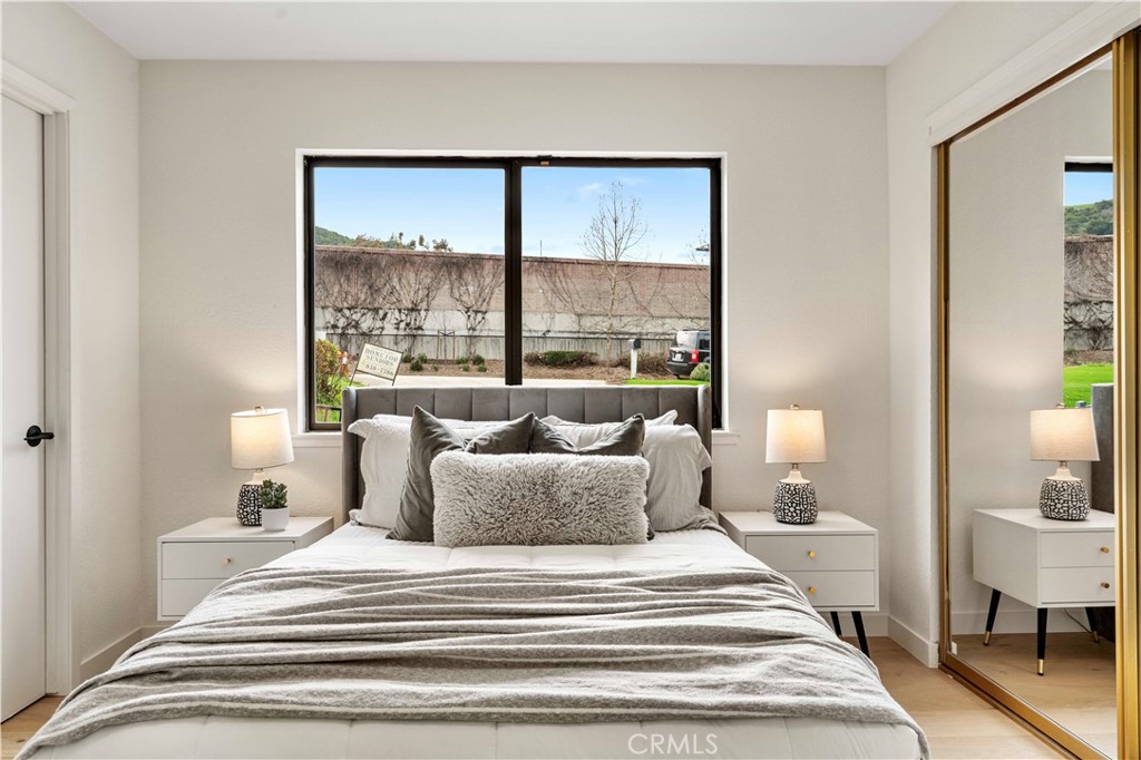 931 Camino Ramon Danville, CA 94526 - Photo 37 of 67 a spacious bedroom with a bed and a large window