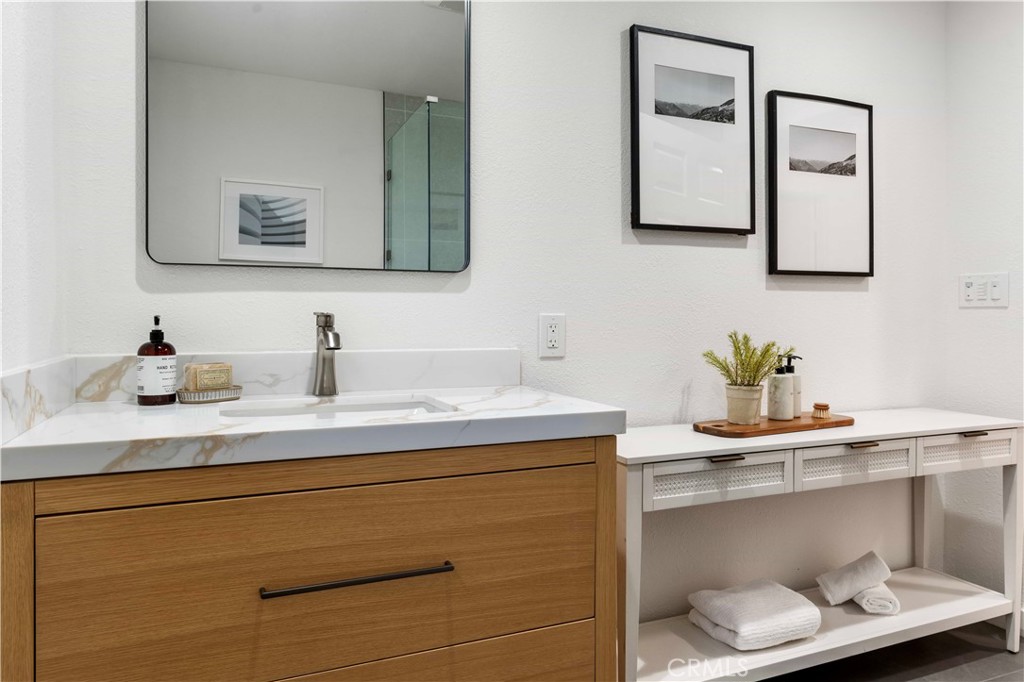 931 Camino Ramon Danville, CA 94526 - Photo 44 of 67 a bathroom with a sink and a mirror