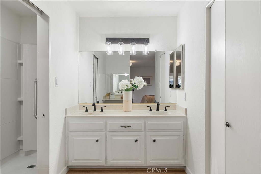 931 Camino Ramon Danville, CA 94526 - Photo 46 of 67 a bathroom with a sink and a mirror