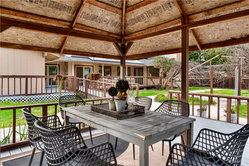 931 Camino Ramon Danville, CA 94526 - Photo 56 of 67 a table and chairs with the view of the roof deck