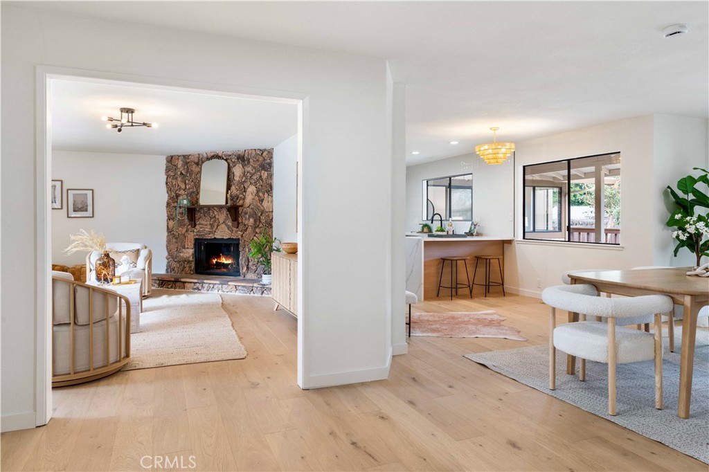 931 Camino Ramon Danville, CA 94526 - Photo 7 of 67 a view of living room kitchen with furniture and wooden floor