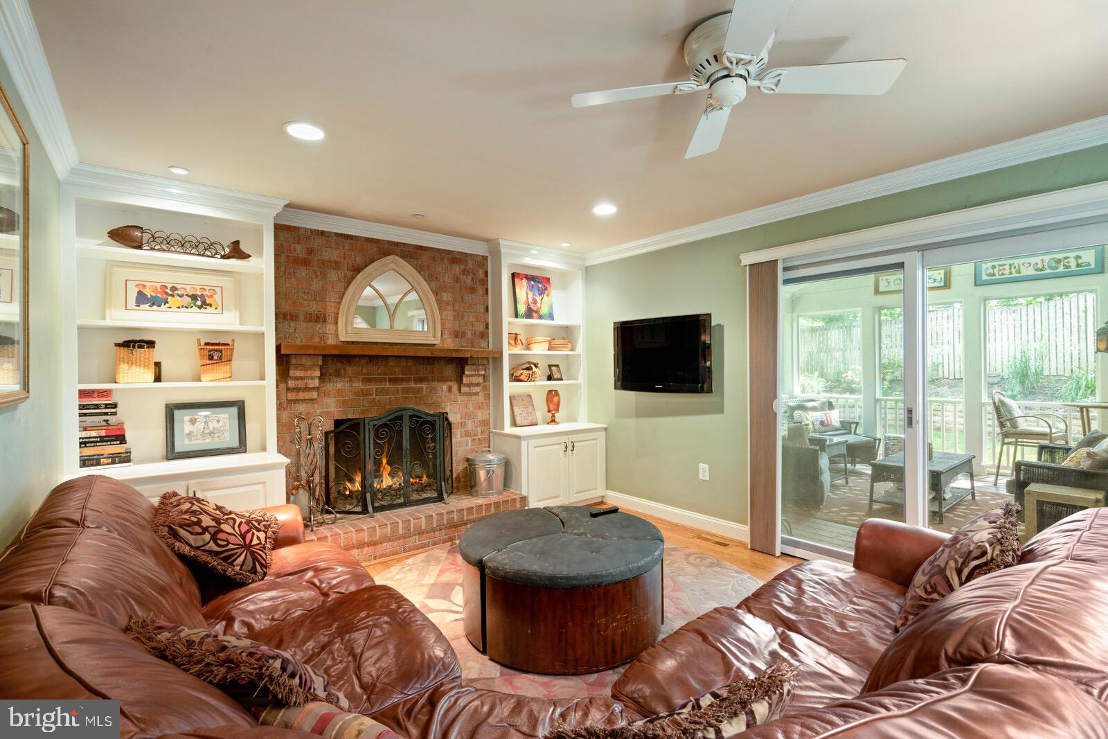 7021 Maple Tree Lane Springfield, VA 22152 - Photo 18 of 44 BRICK FIREPLACE WITH BUILT-INS