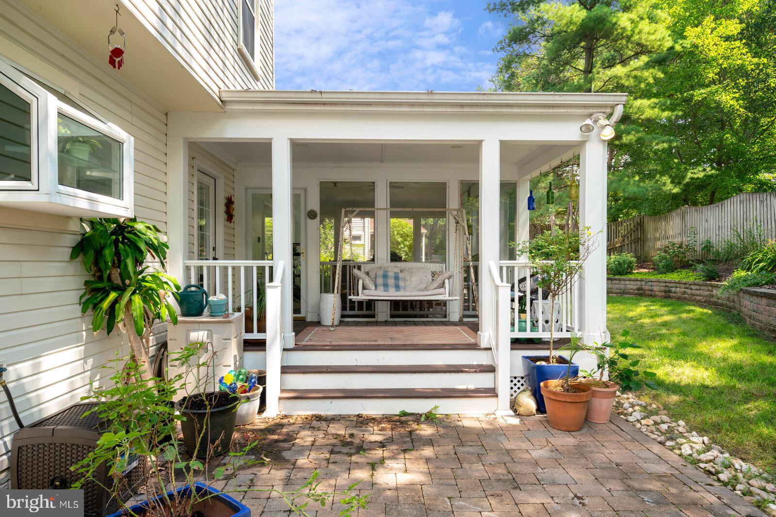 7021 Maple Tree Lane Springfield, VA 22152 - Photo 24 of 44 PORCH LEADS TO BRICK PATIO