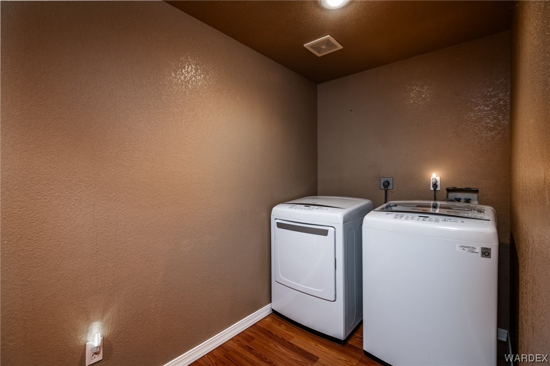 10363 East Blake Ranch Road Kingman, AZ 86401 - Photo 16 of 79 a utility room with dryer and washer