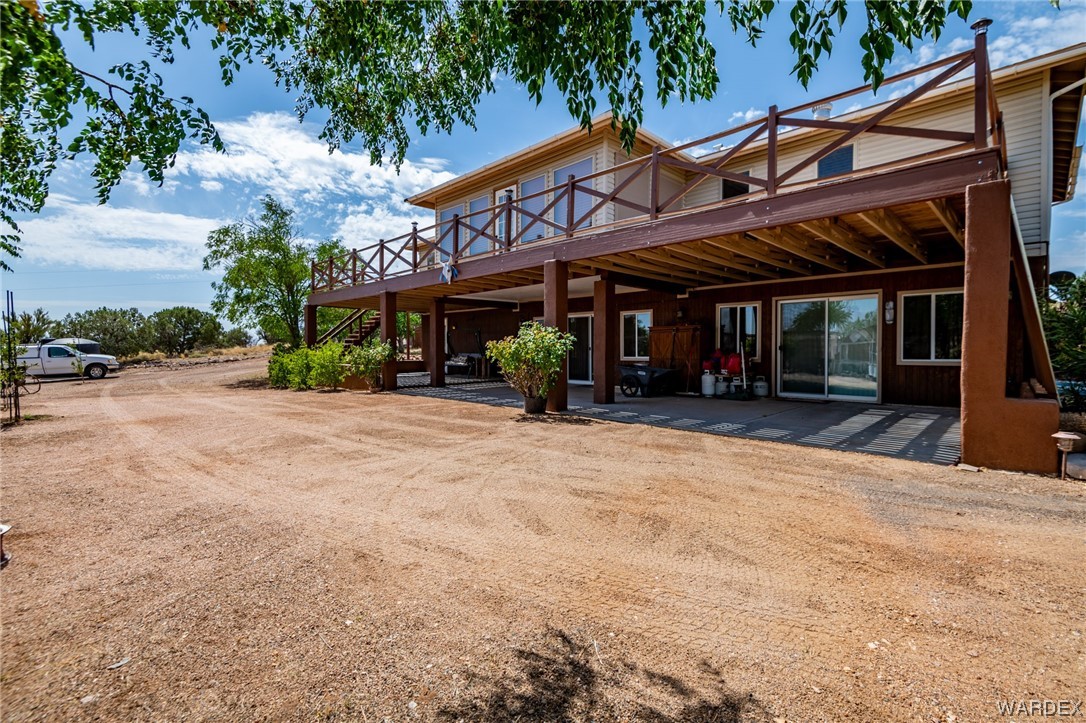 10363 East Blake Ranch Road Kingman, AZ 86401 - Photo 43 of 79 a view of a house with a patio