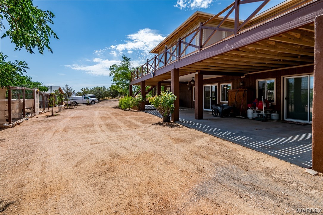 10363 East Blake Ranch Road Kingman, AZ 86401 - Photo 44 of 79 a view of a building with a outdoor space
