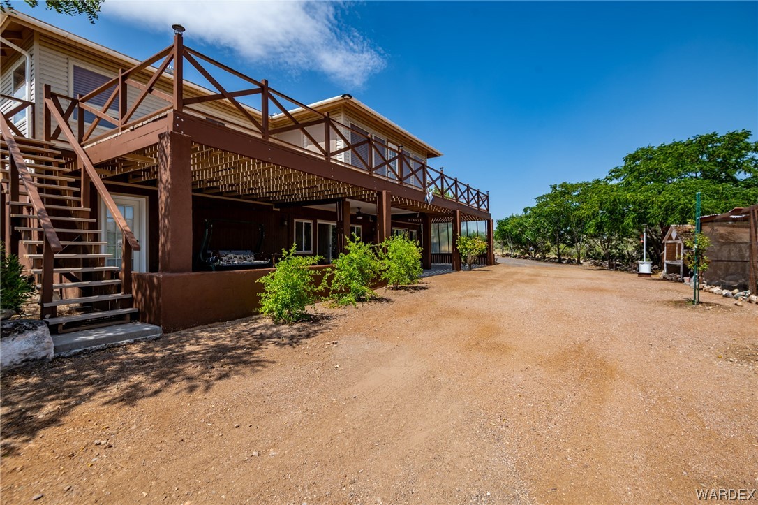 10363 East Blake Ranch Road Kingman, AZ 86401 - Photo 45 of 79 a view of a house with a street