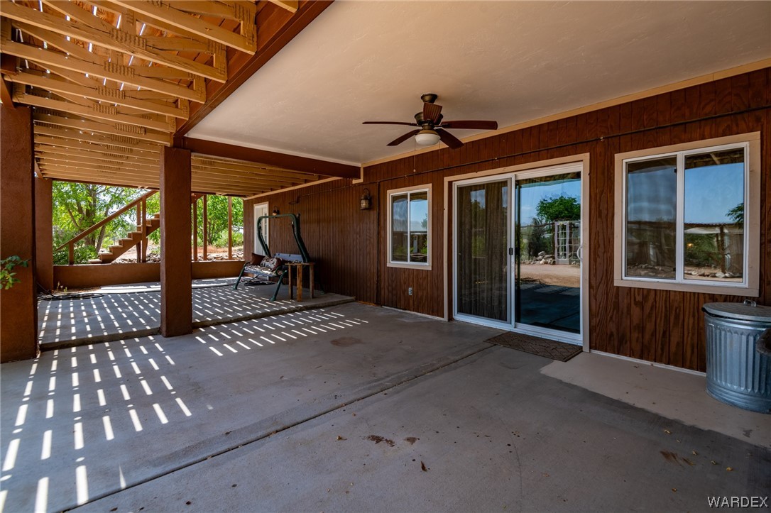 10363 East Blake Ranch Road Kingman, AZ 86401 - Photo 47 of 79 a porch with seating space
