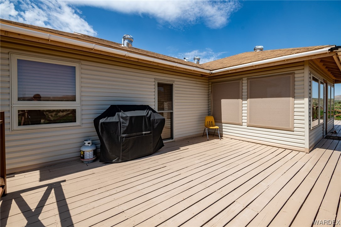 10363 East Blake Ranch Road Kingman, AZ 86401 - Photo 50 of 79 a view of a car park in front of the house