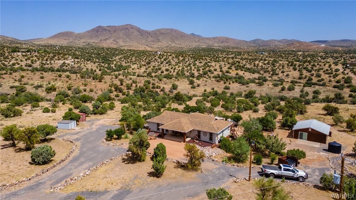 10363 East Blake Ranch Road Kingman, AZ 86401 - Photo 60 of 79 an aerial view of residential house and an outdoor space