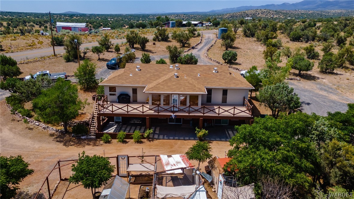 10363 East Blake Ranch Road Kingman, AZ 86401 - Photo 65 of 79 an aerial view of a house with garden space lake view and mountain view