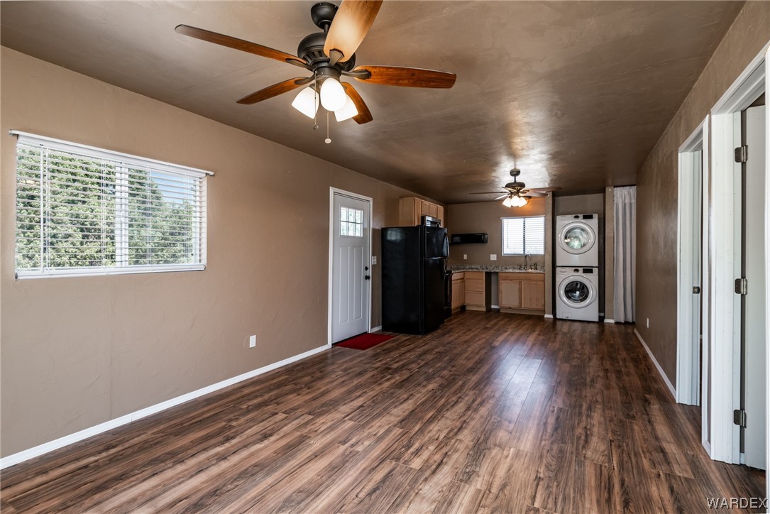 10363 East Blake Ranch Road Kingman, AZ 86401 - Photo 73 of 79 wooden floor in an empty room with a window