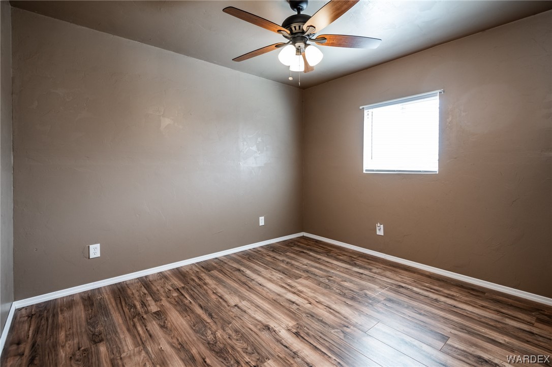 10363 East Blake Ranch Road Kingman, AZ 86401 - Photo 78 of 79 a view of room with window and ceiling fan