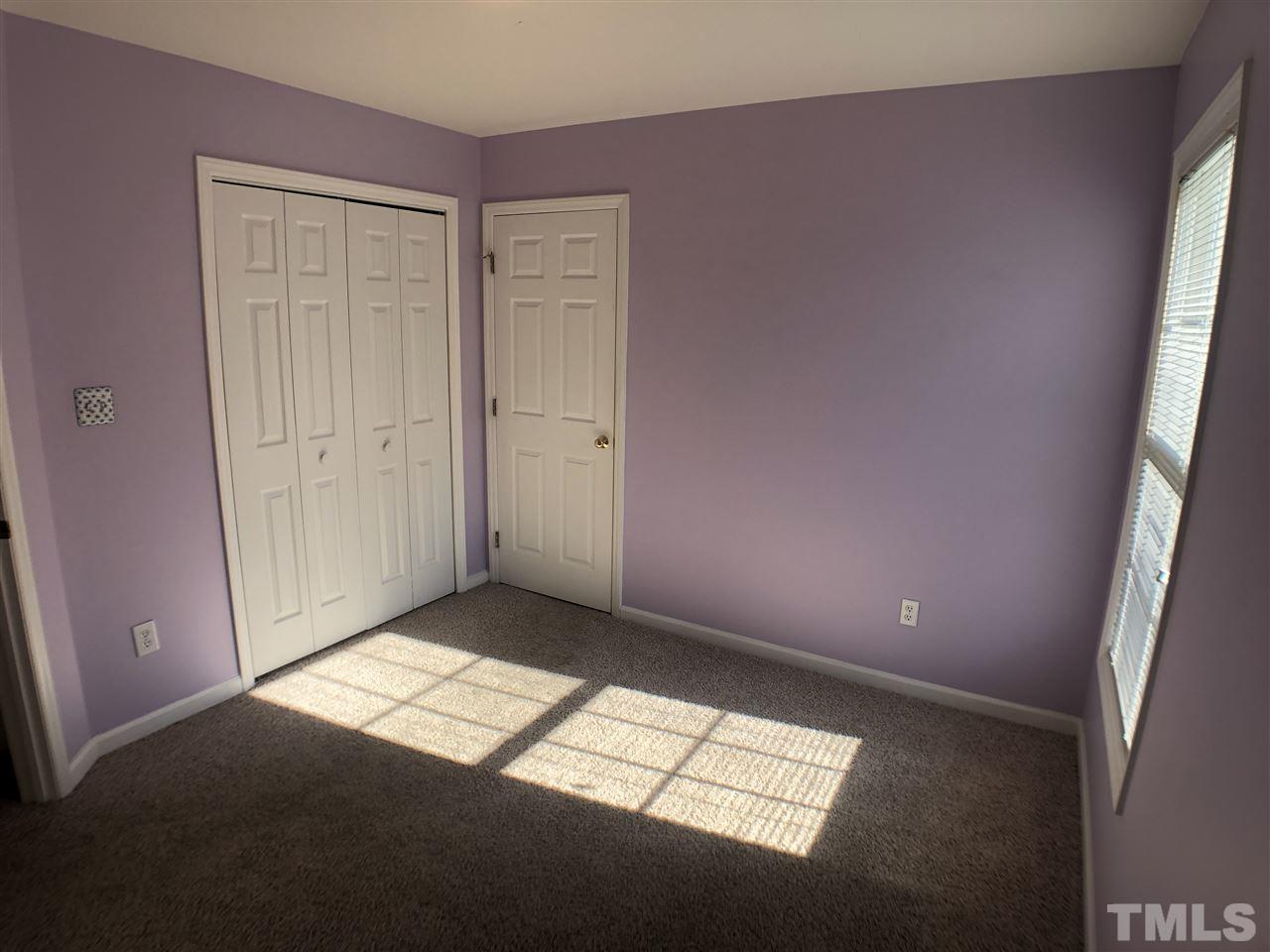 2400 Clerestory Place Raleigh, NC 27615 - Photo 22 of 30 an empty room with windows