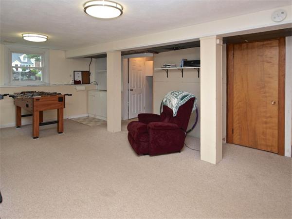 42 Felch Road Natick, MA 01760 - Photo 15 of 21 a living room with furniture a dining table and chairs