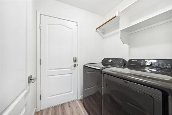 a utility room with dryer and washer