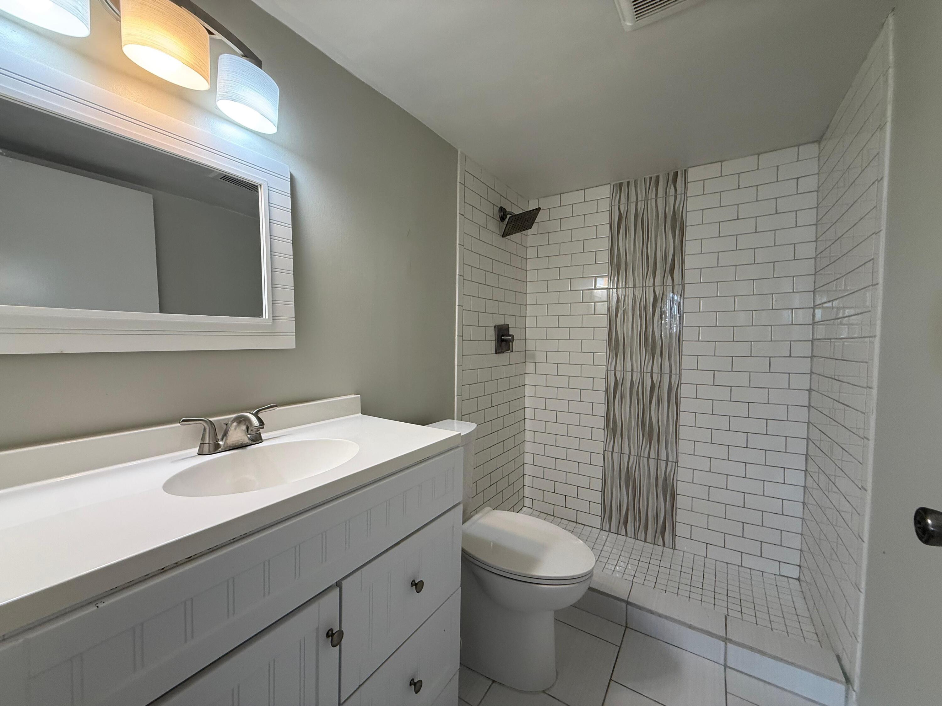 2141 Woolbright Road, Unit L106 Boynton Beach, FL 33426 - Photo 9 of 11 Primary Bathroom