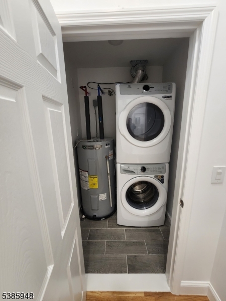 189 Main Street, Unit 3B Paterson, NJ 07505 - Photo 5 of 5 a bathroom with a toilet and a sink