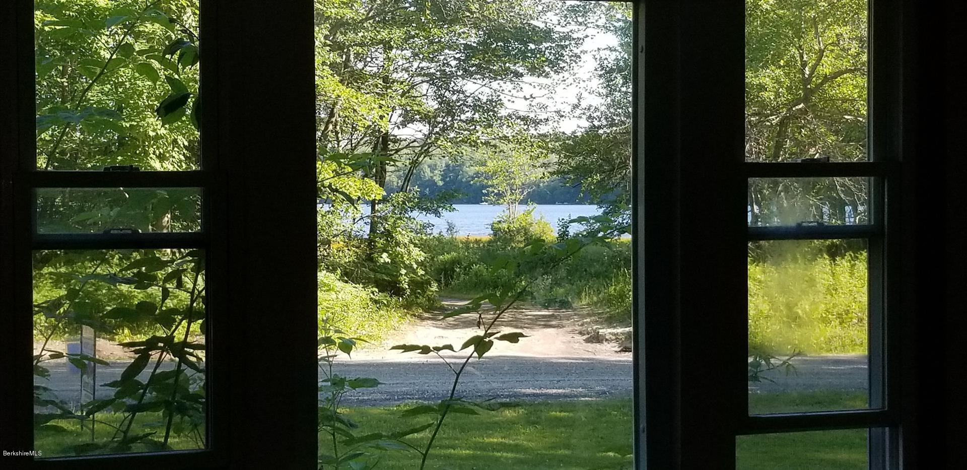 25 Leonhardt Road Becket, MA 01223 - Photo 1 of 12 a view of lake from a window