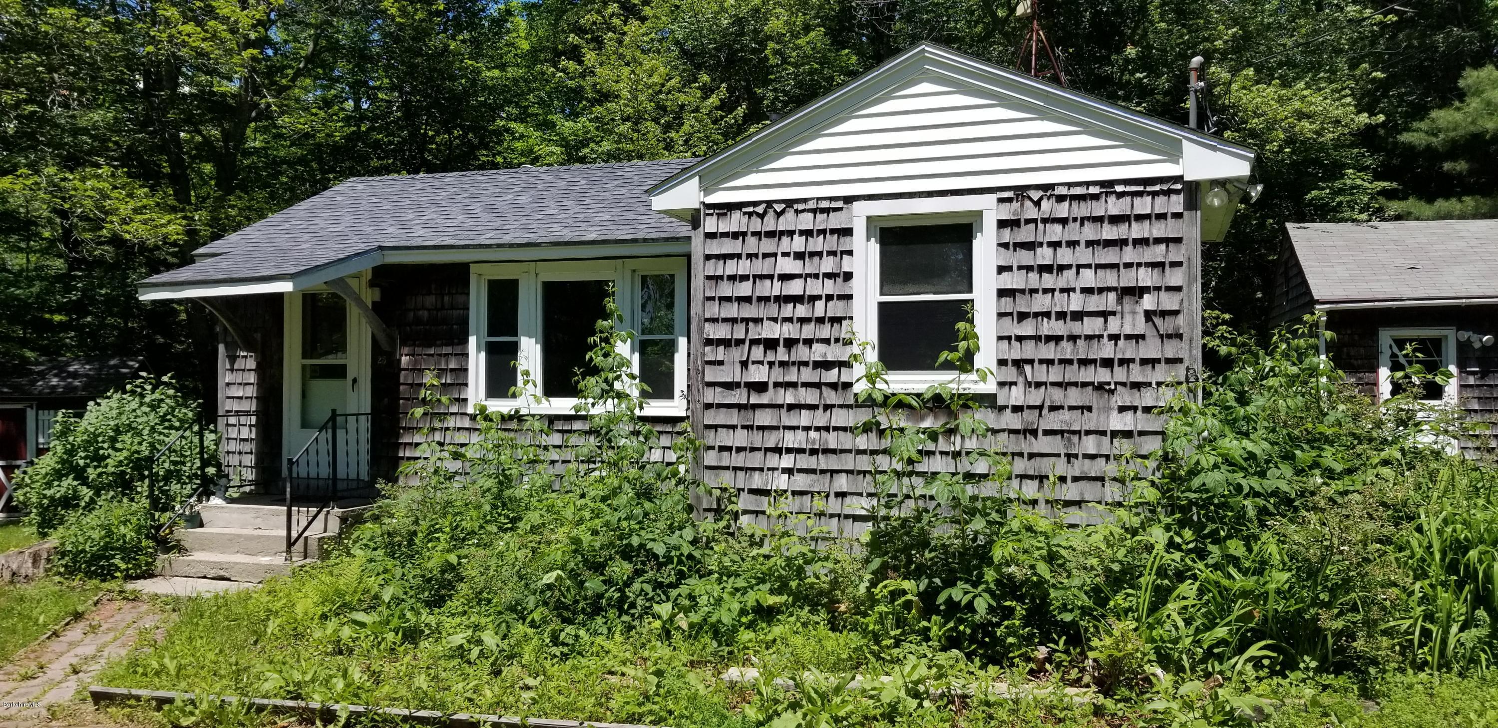 25 Leonhardt Road Becket, MA 01223 - Photo 3 of 12 a view of a house with garden