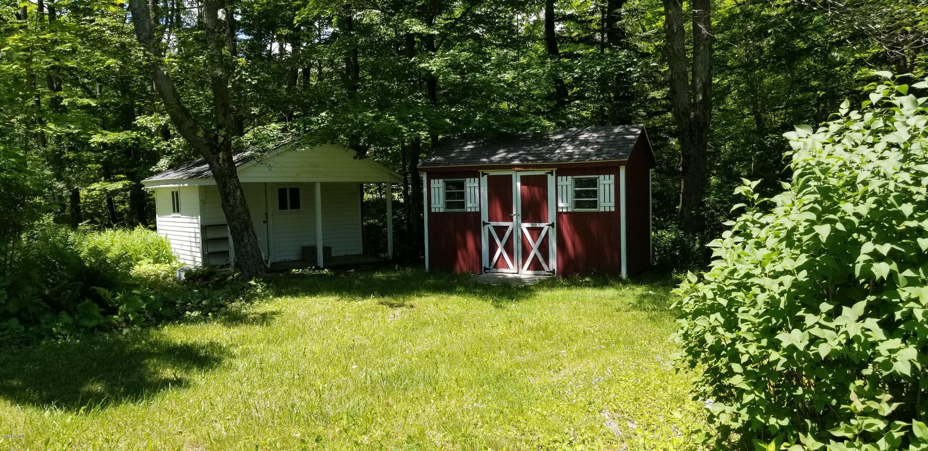 25 Leonhardt Road Becket, MA 01223 - Photo 9 of 12 front view of a house with a yard