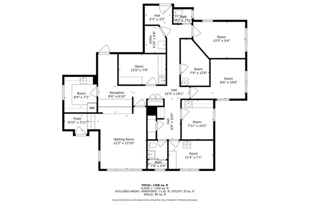 a view of a brick building next to a big yard