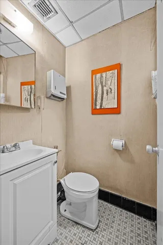 a room with furniture a rug and a window