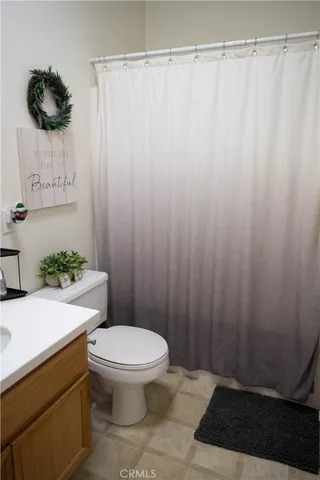 a bedroom with bed and window