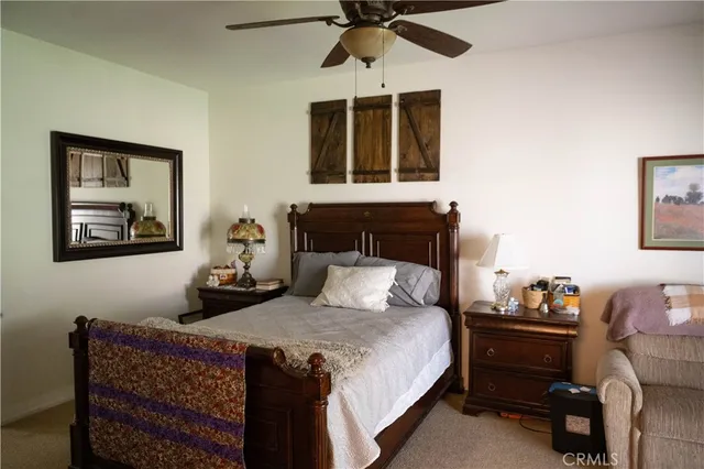 a house view with a sitting space and garden