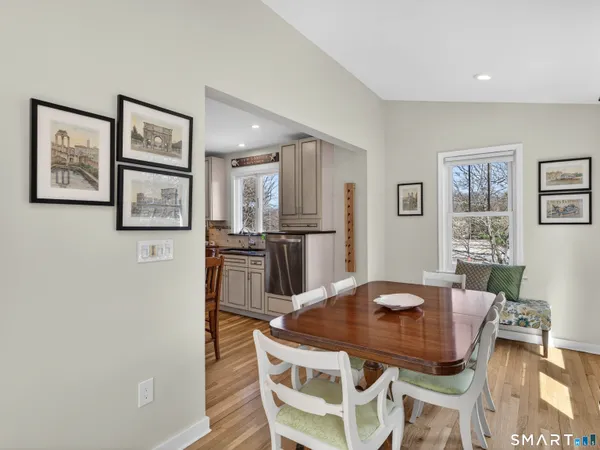 a view of entryway with wooden floor